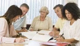 Adult students studying together